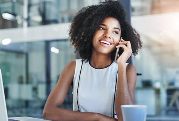 Lady using phone in office